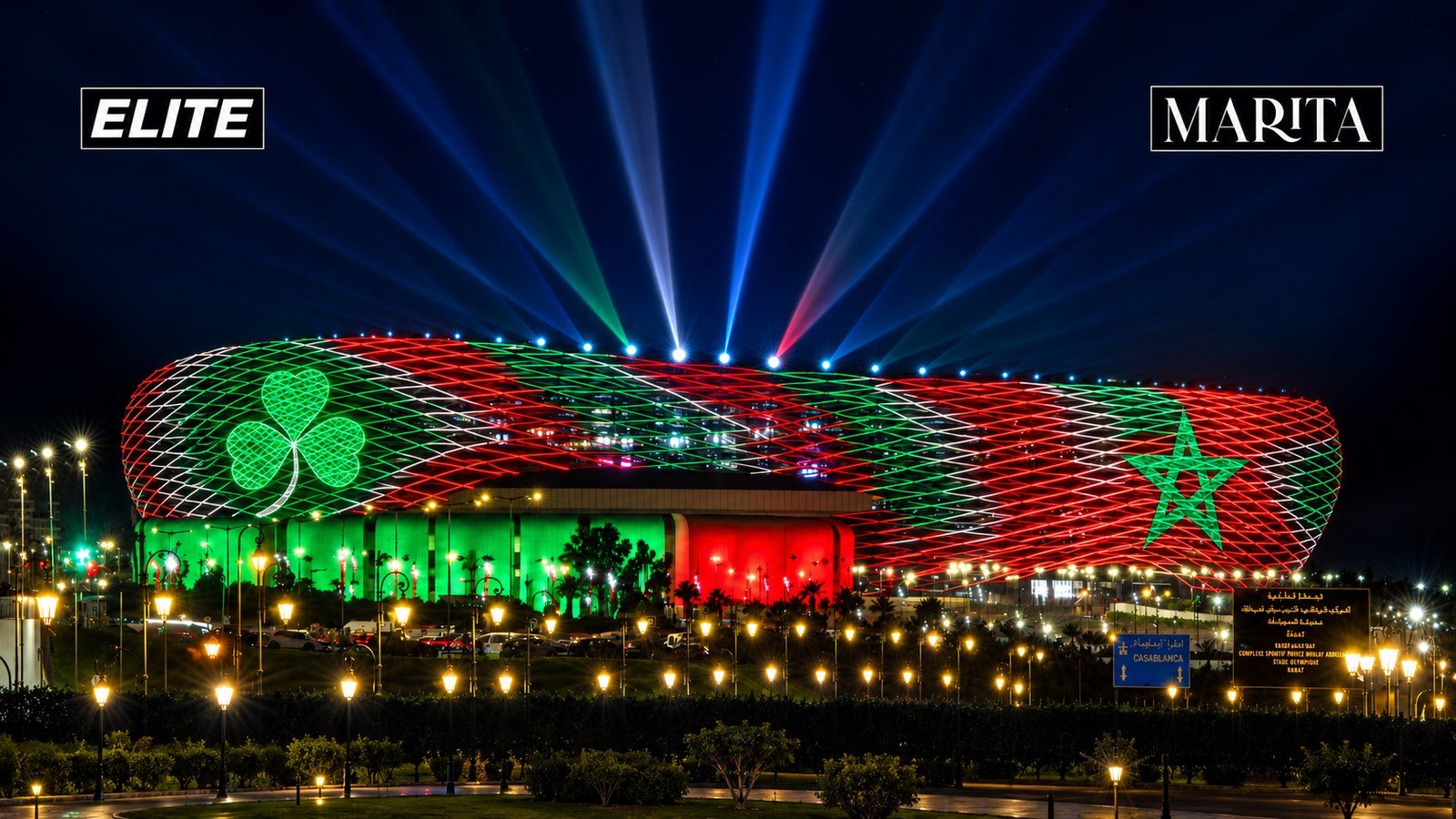 Stadium exterior at night lit with a shamrock and Moroccan star